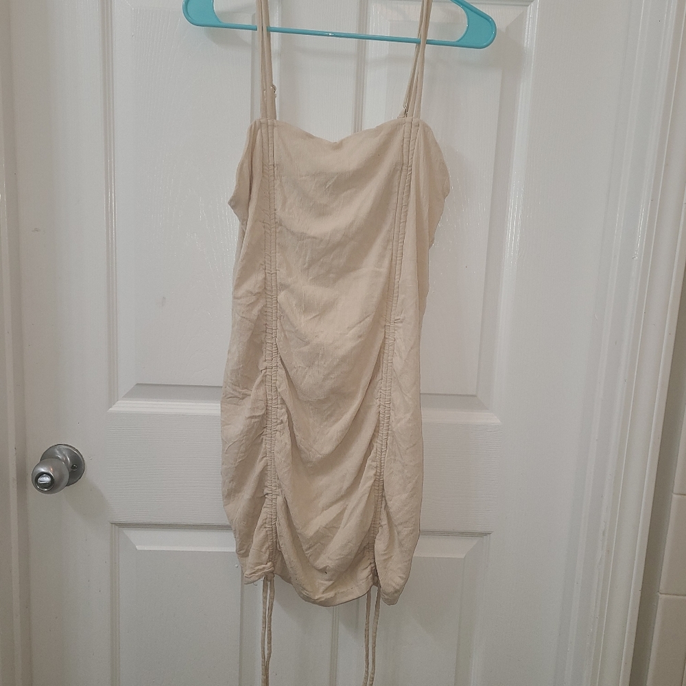 Fitted dress with tie detail large light khaki color